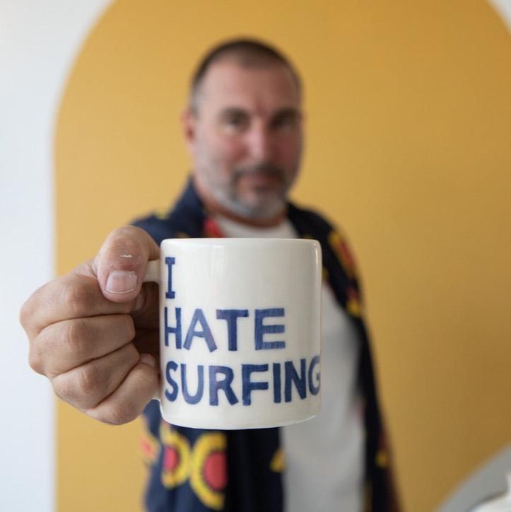 Beach Grit 'I HATE SURFING' diner mug.