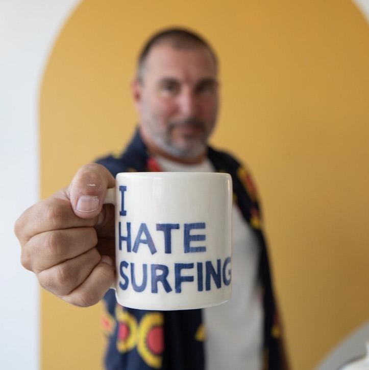 Beach Grit 'I HATE SURFING' diner mug.